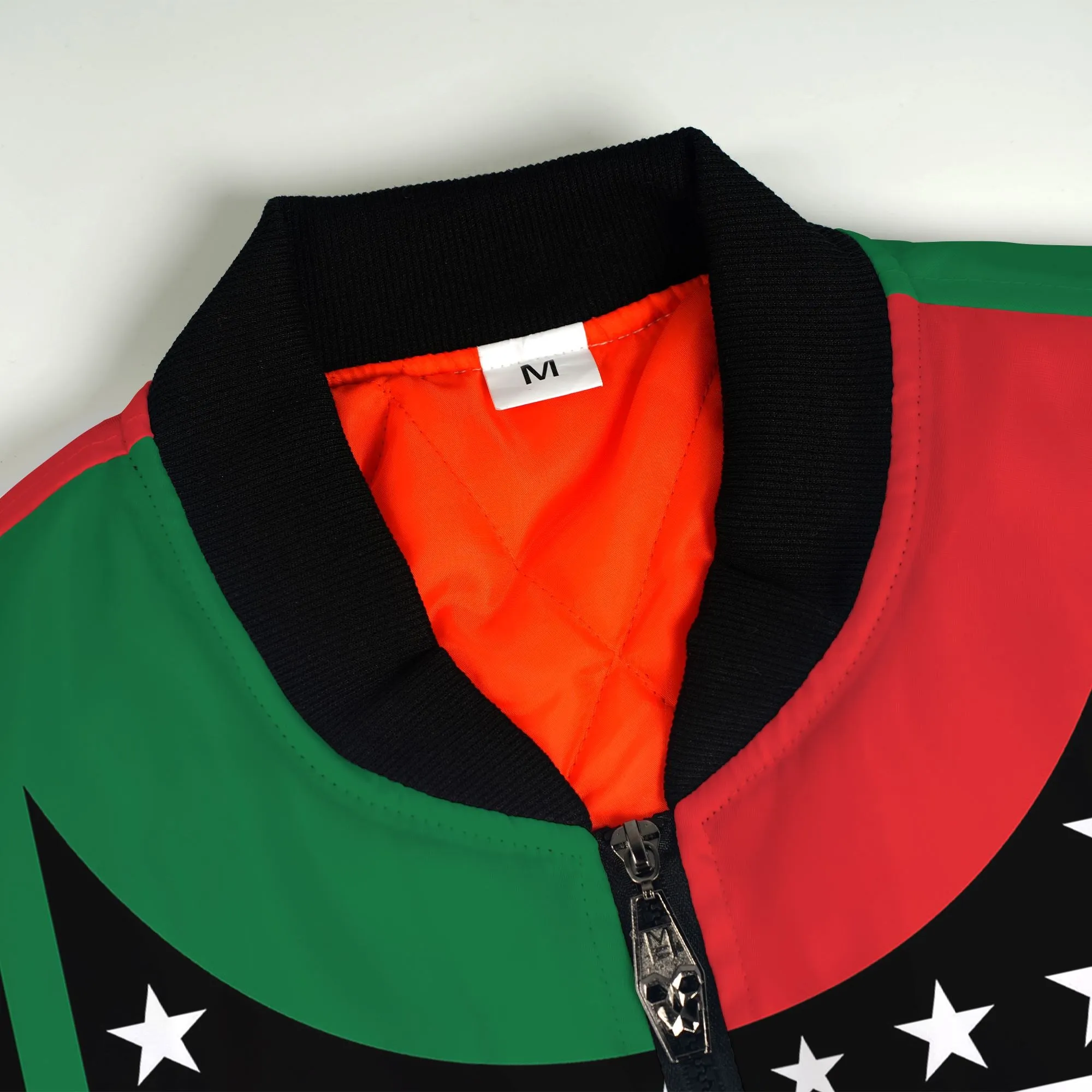 Power Fist And Patterns In Pan African Colors Bomber Jacket